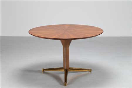 BEGA MELCHIORRE (1898 - 1976) Tavolo in legno di palissandro e ottone, 1950....