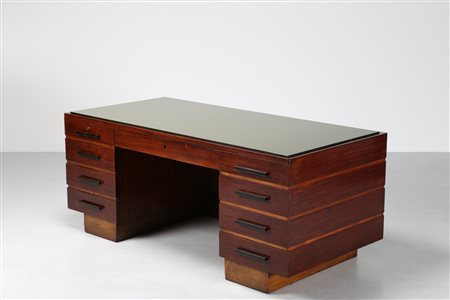 PONTI GIO' (1891 - 1979) Imponente scrivania in legno di palissandro e acero...