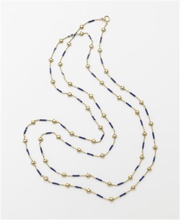 Collana lunga in oro giallo con smalti blu, g. 59, lungh. cm 170 Prov.: nonna...