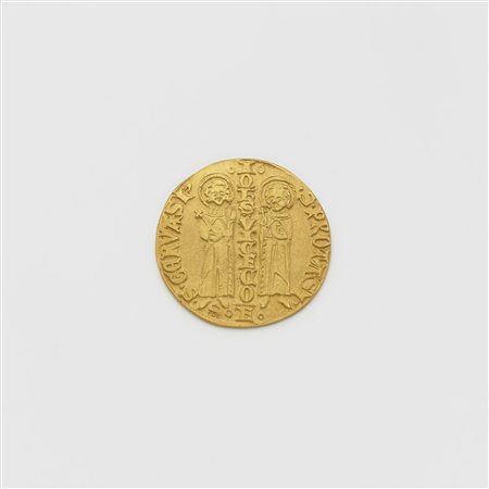 Riproduzione in oro di un "Ambrogino d'oro" g. 5,7 Reproduction in gold of an...