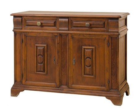 CREDENZA a due ante in noce. Italia XX secolo Misure: cm 120 x 45 x h 90