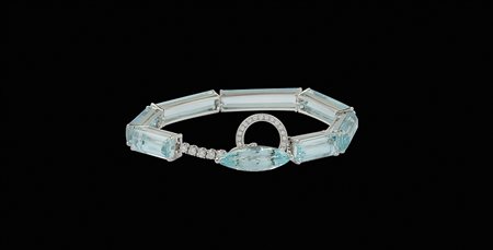 Bracciale semirigido in oro bianco 18kt peso 24,7 gr. con sette acquamarine...