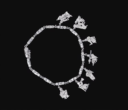 Bracciale charms "orchestra" in platino e diamanti peso 13 gr. taglio...