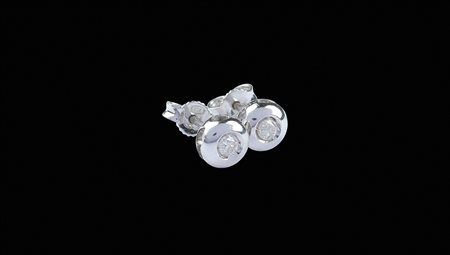 Orecchini punto luce in oro bianco 18kt peso 2,1 gr. con diamanti taglio...