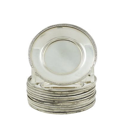 Dodici piattini pane in argento Italia, XX Sec. d. 9 cm. peso 575 gr.