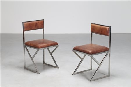 MANIFATTURA ITALIANA Coppia di sedie in metallo cromato e pelle, anni 70. -....