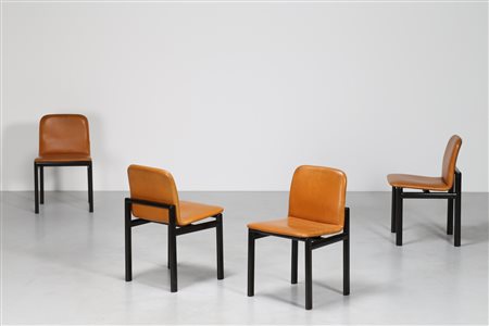 CITTERIO ANTONIO (n. 1950) Quattro sedie in legno laccato nero e pelle, anni...