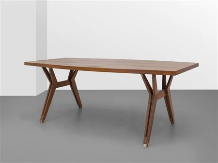 ICO PARISI Un tavolo per MIM, anni '60. Legno di noce, legno impiallacciato...