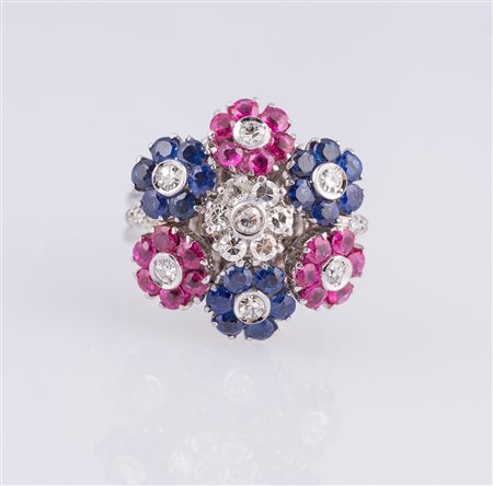 Anello "Tremblant" a fiori con diamanti per cts 0.24 zaffiri e rubini per cts...