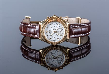 Un orologio Breitling cronografo in oro 18 kt. . . [Nessun Autore] . . .