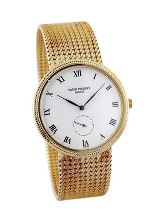 PATEK PHILIPPE Mod. "Calatrava", ref. 3919J, anni '90 Diam. 33 mm Cassa in...