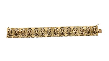 BRACCIALE Peso gr 39,4 in oro giallo lucido e satinato, lavorato a segmenti...